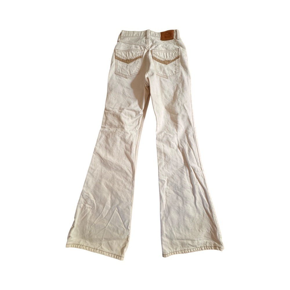 Levi’s Premium 70s Movin’ On High Rise Flare Jeans in Sunny Cream - Picture 6 of 15